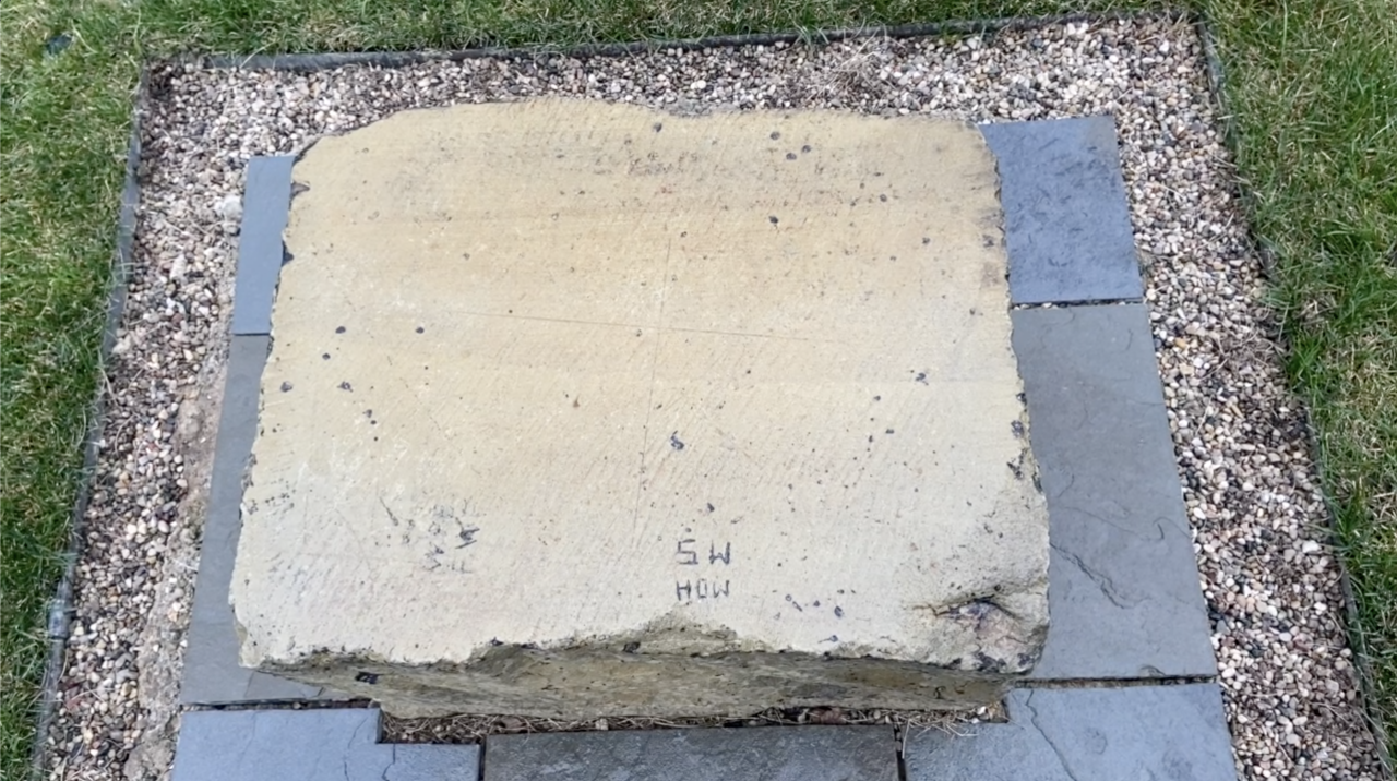One of the stones carved with perpendicular meridian lines that allowed early surveyors to use astronomy to map the area