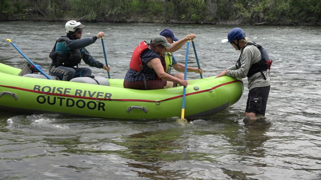 The guide going over instructions before going down the river