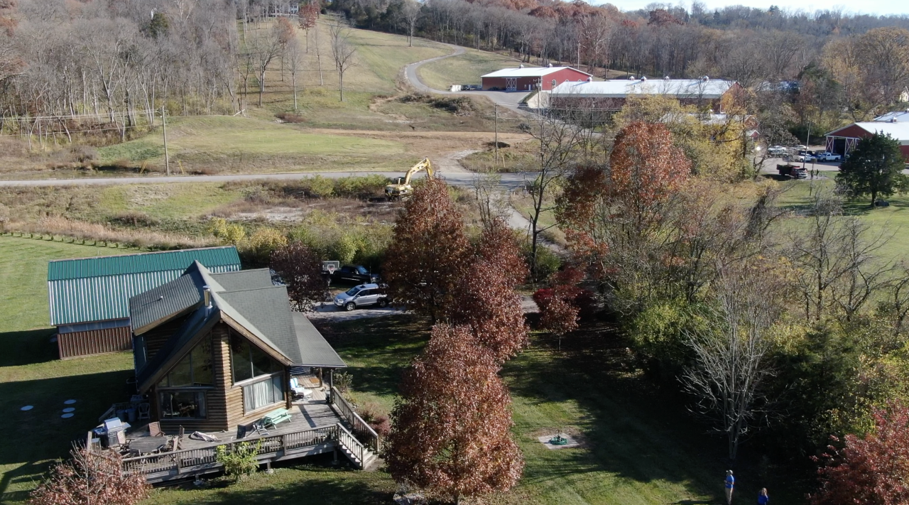 When Jason Gordon built a log cabin in 2005, he was surrounded by woods until Doug Evans moved next door.