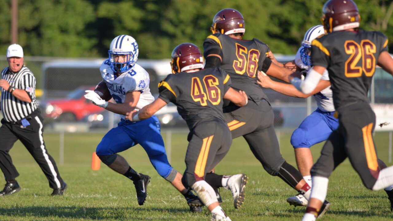 PHOTOS: Cooper shocks Highlands