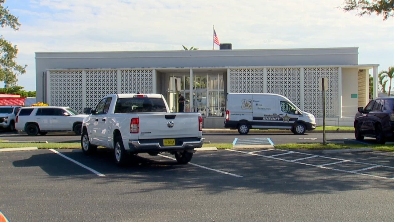 Squad cars around Clewiston City Hall
