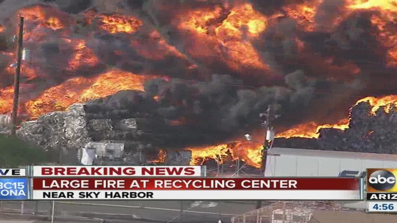 PHOTOS: Fire burns at PHX recycling plant