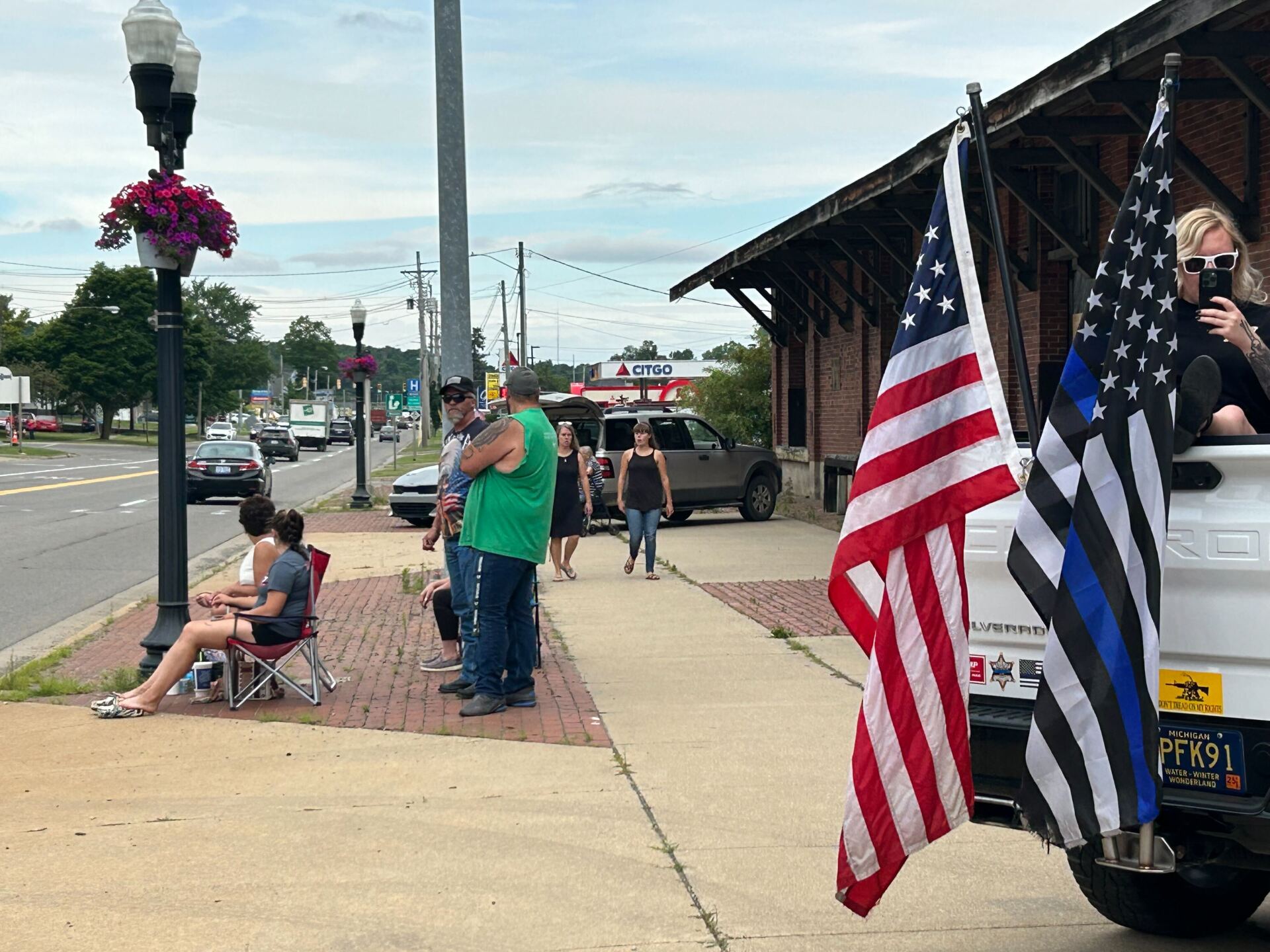 Neighbors paying respects in Hilldale