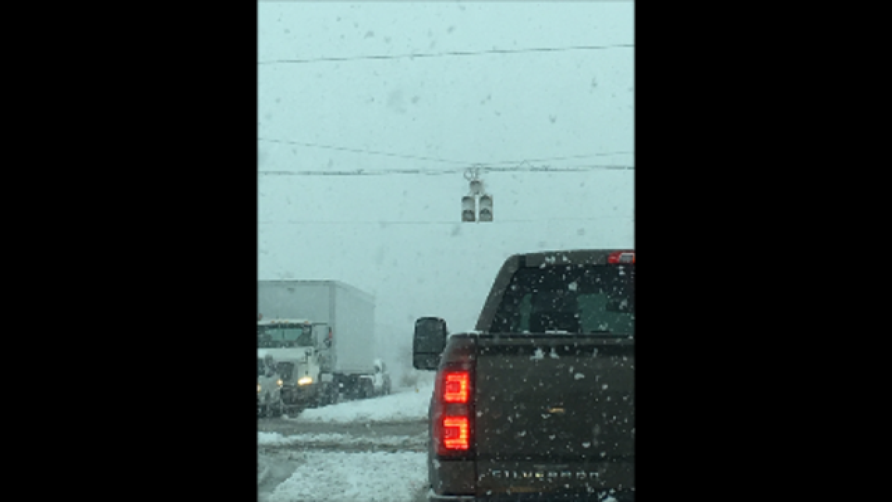 PHOTOS: Central Indiana gets hit with rain, snow