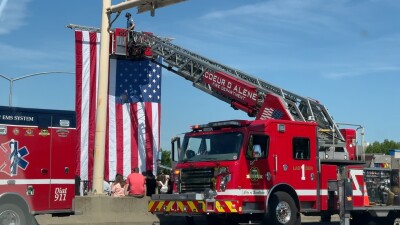 cu fire truck holding flag