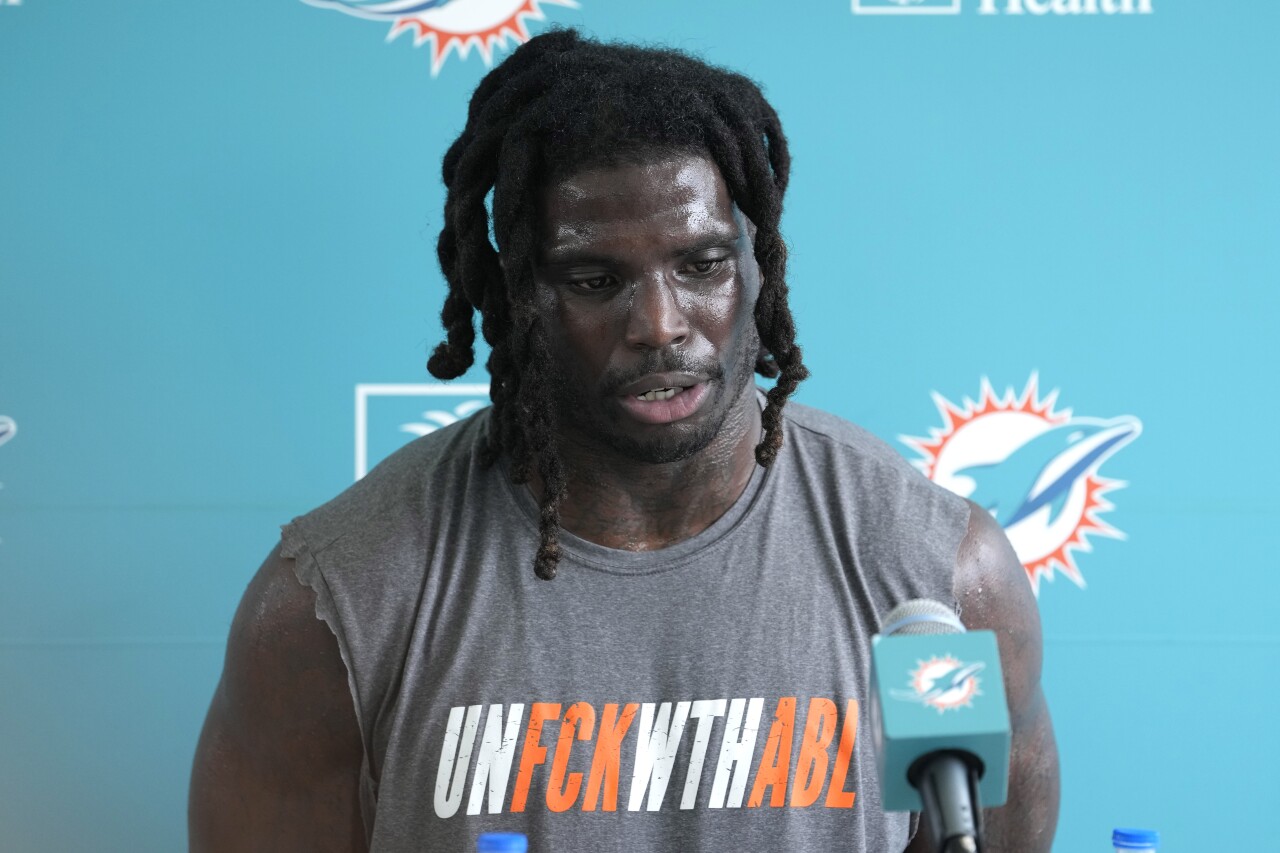 Miami Dolphins receiver Tyreek Hill speaks with reporters after training camp, July 26, 2023
