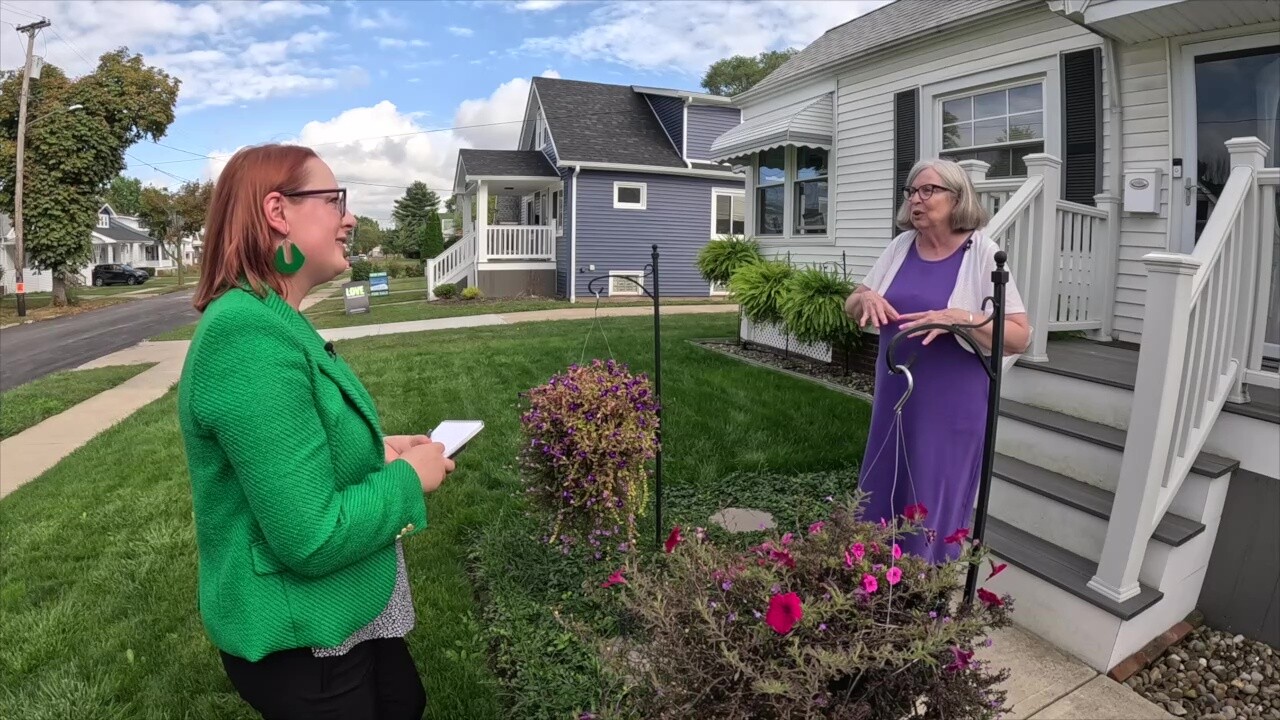 Anne Dalzell, right, a longtime Collinwood resident, talks to News 5 reporter Michelle Jarboe about the neighborhood.