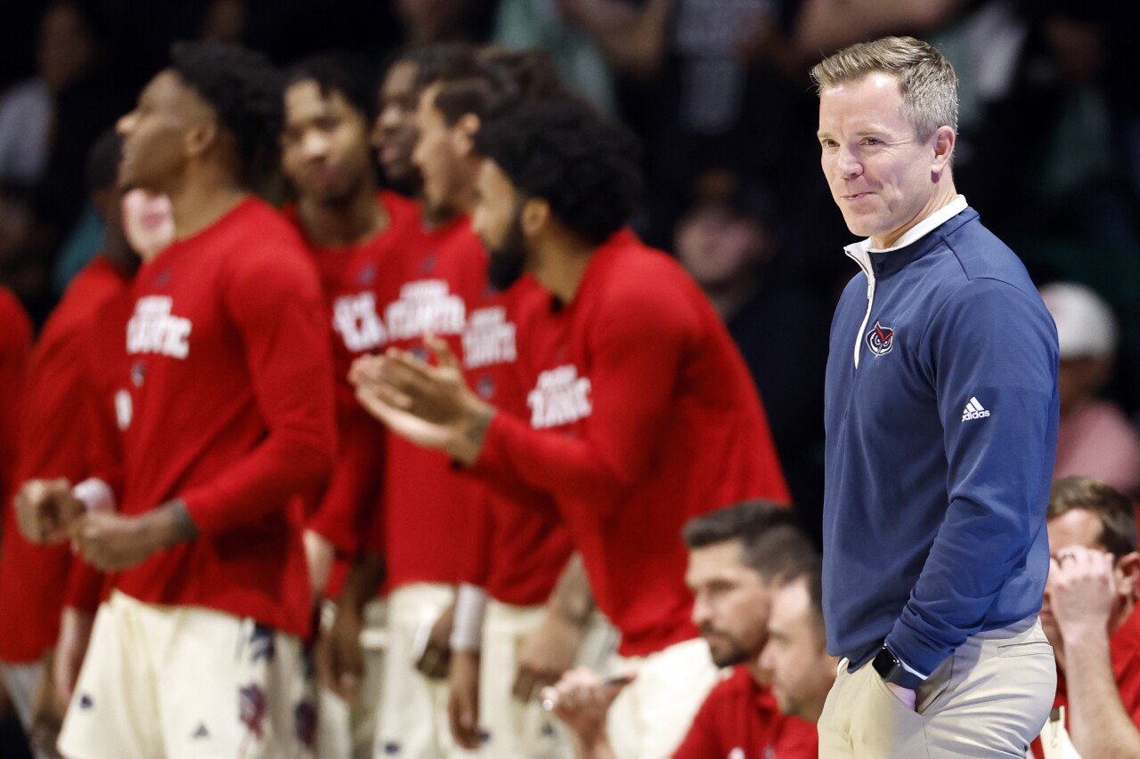 Florida Atlantic Owls head coach Dusty May smiles after score, Feb. 8, 2024