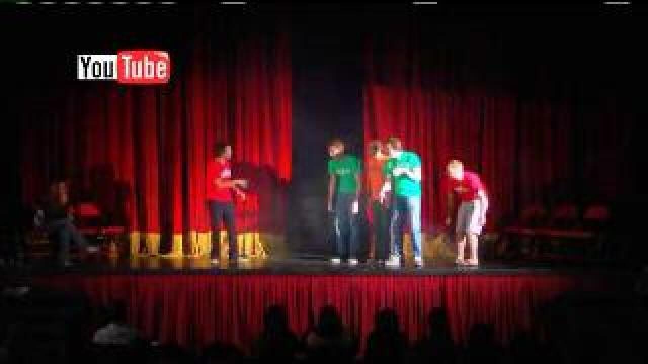 Melissa Singleton and Clint Erekson on the And Go Improv fundraiser