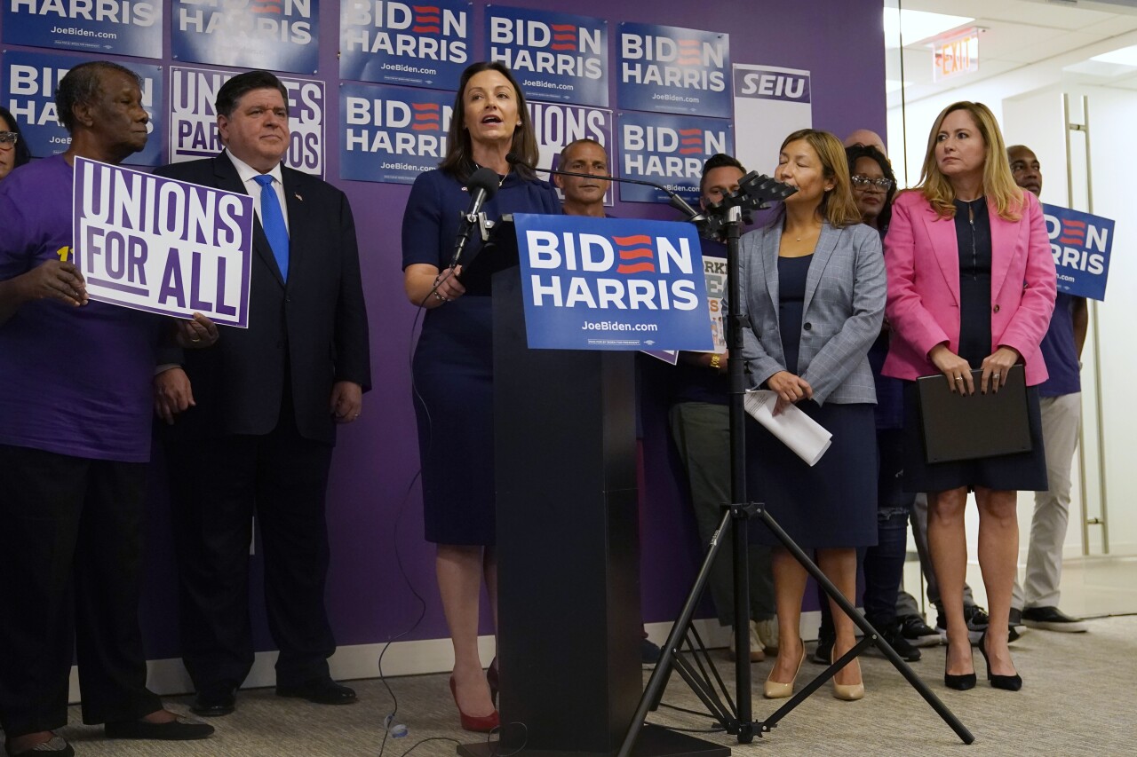 Nikki Fried speaks during news conference supporting Joe Biden and Kamala Harris in Miami, Nov. 7, 2023