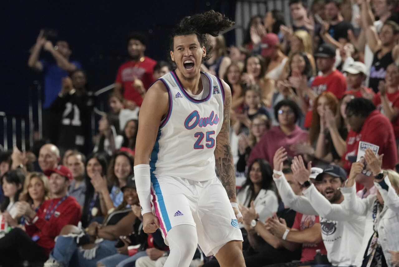 Florida Atlantic forward Tre Carroll reacts after scoring and drawing foul during second half against Tulsa, Feb. 3, 2024