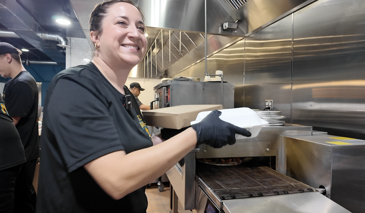 Missy Loomis serving a customer
