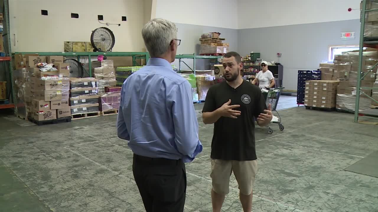 Bill Fitzgerald and Chesterfield Food Bank Outreach Center Assistant Executive Director Nick Jenkins