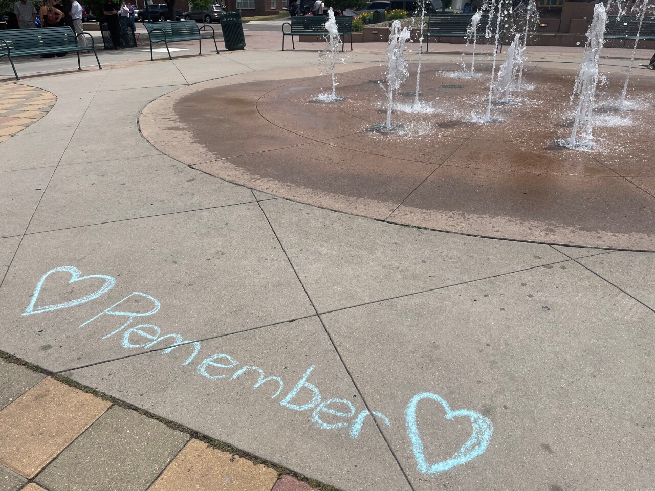 A chalk memorial for Johnny Hurley at Olde Town Arvada Square.