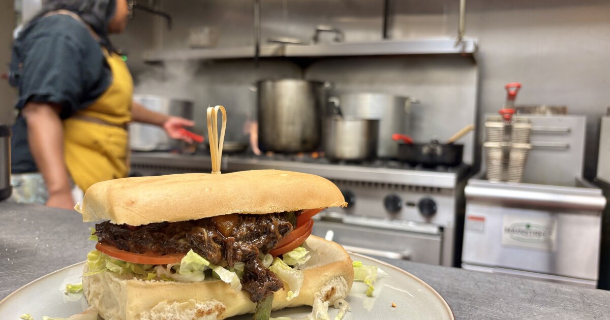 Pass the ball and the plate: Waiting to Oxtail feeds CIAA fans Caribbean dishes with a twist