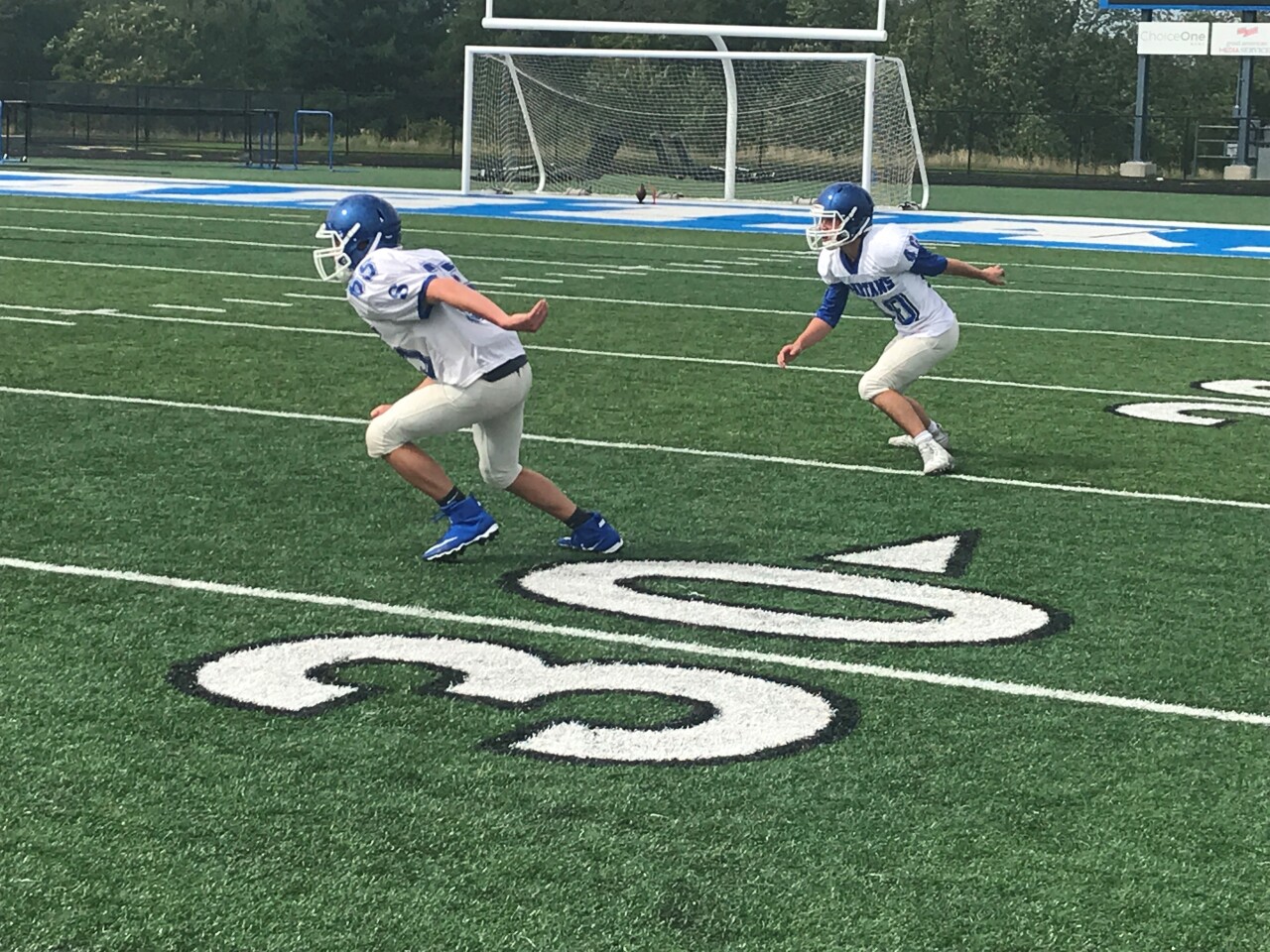 Sparta-Spartans-varsity-football-practice-two-players-September-11-2020.jpg