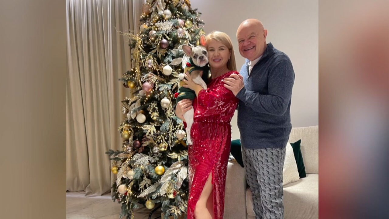 Walter, Oksana and their dog, Ukrainian refugees who came to Delray Beach