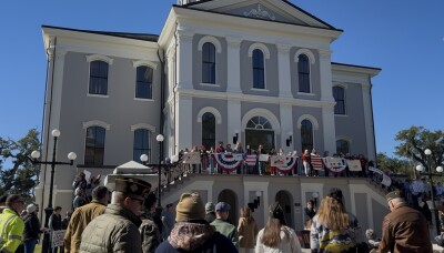 Thomasville honors veterans with downtown flag ceremony and acts of service.