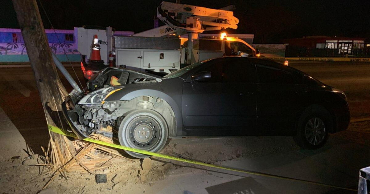 Prince Road closed after car crashes into utility pole