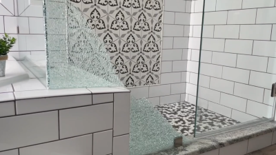 Woman's shower glass shatters suddenly