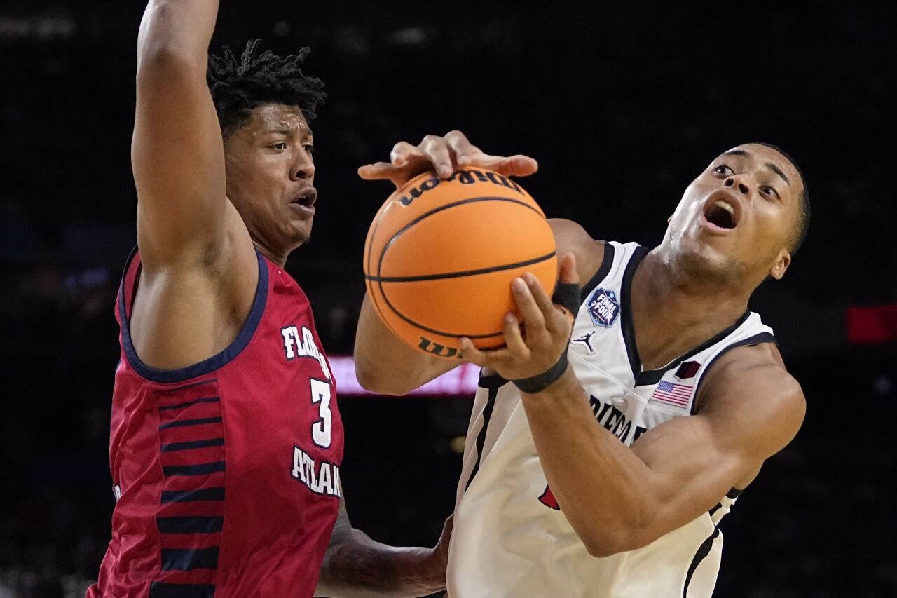 San Diego State Aztecs forward Jaedon LeDee drives to the basket past Florida Atlantic Owls forward Giancarlo Rosado in second half of Final Four, April 1, 2023