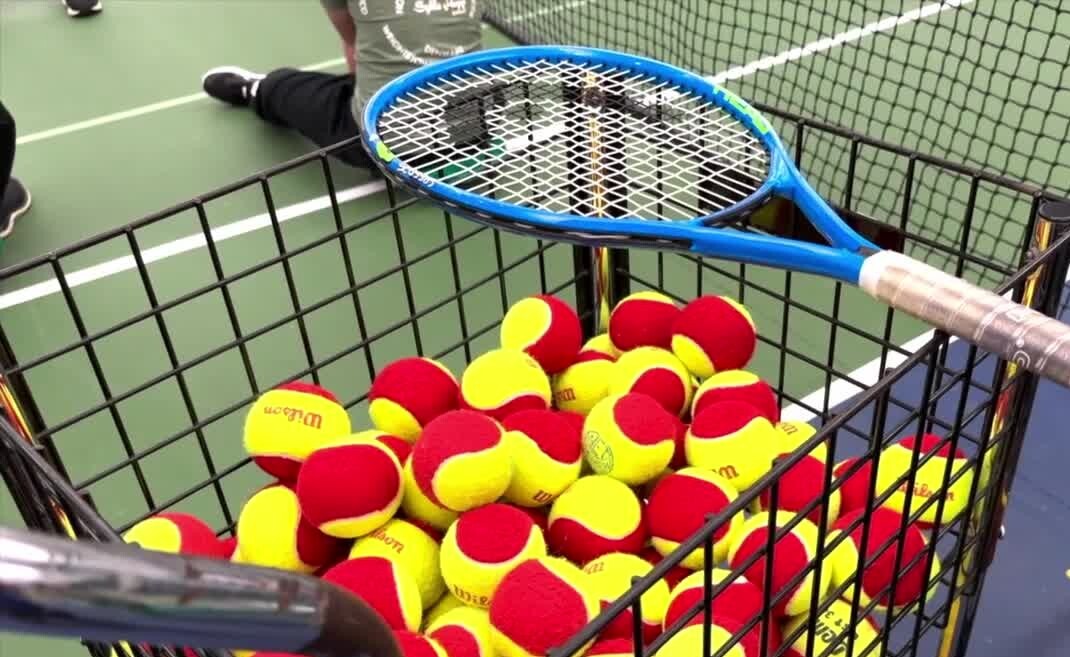 Tennis Balls and Racket
