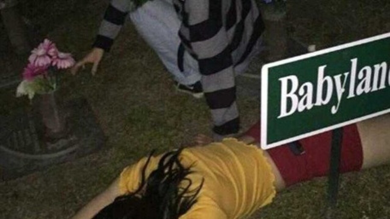 Social media photos show teens on graves