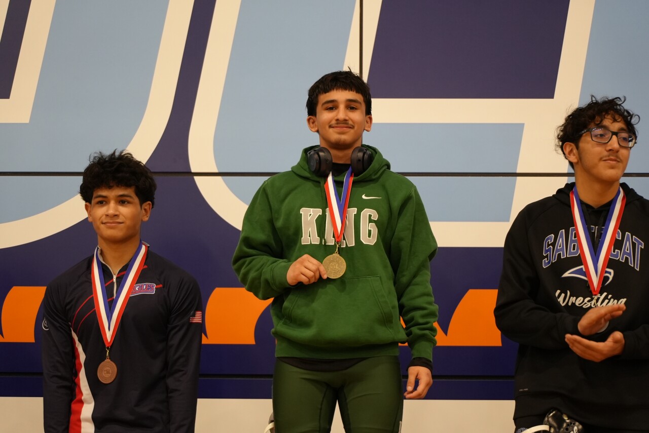King wrestler Aiden DeLeon wins district