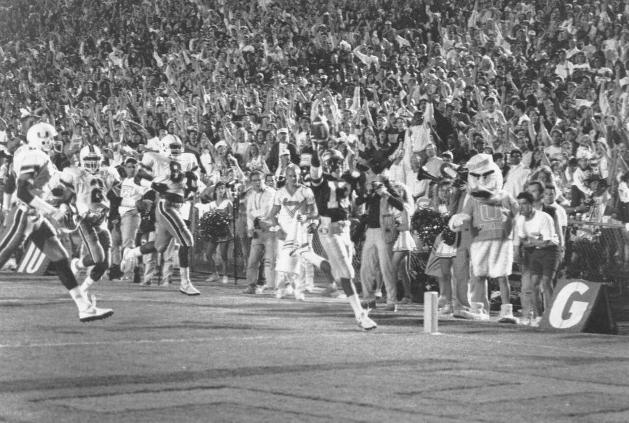 Florida State Seminoles running back Dexter Carter scores TD vs Miami Hurricanes in 1989 black and white