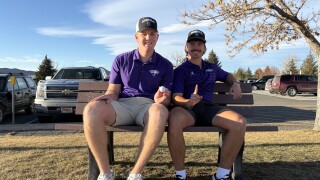 Carroll men's golfers Taylor "TJ" Fierling (left) and Hudson Reinke (right) sit side-by-side at Bill Roberts Golf Course.