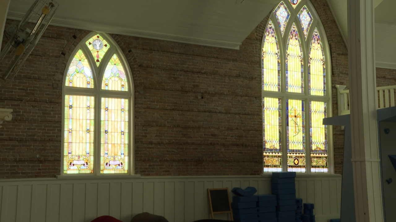 The beautiful red brick building with the ornate stained glass windows we know today was built in 1913.