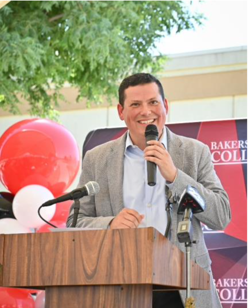 Rudy Salas speaks at a luncheon commemorating the 50th anniversary of the Delano Campus of Bakersfield College