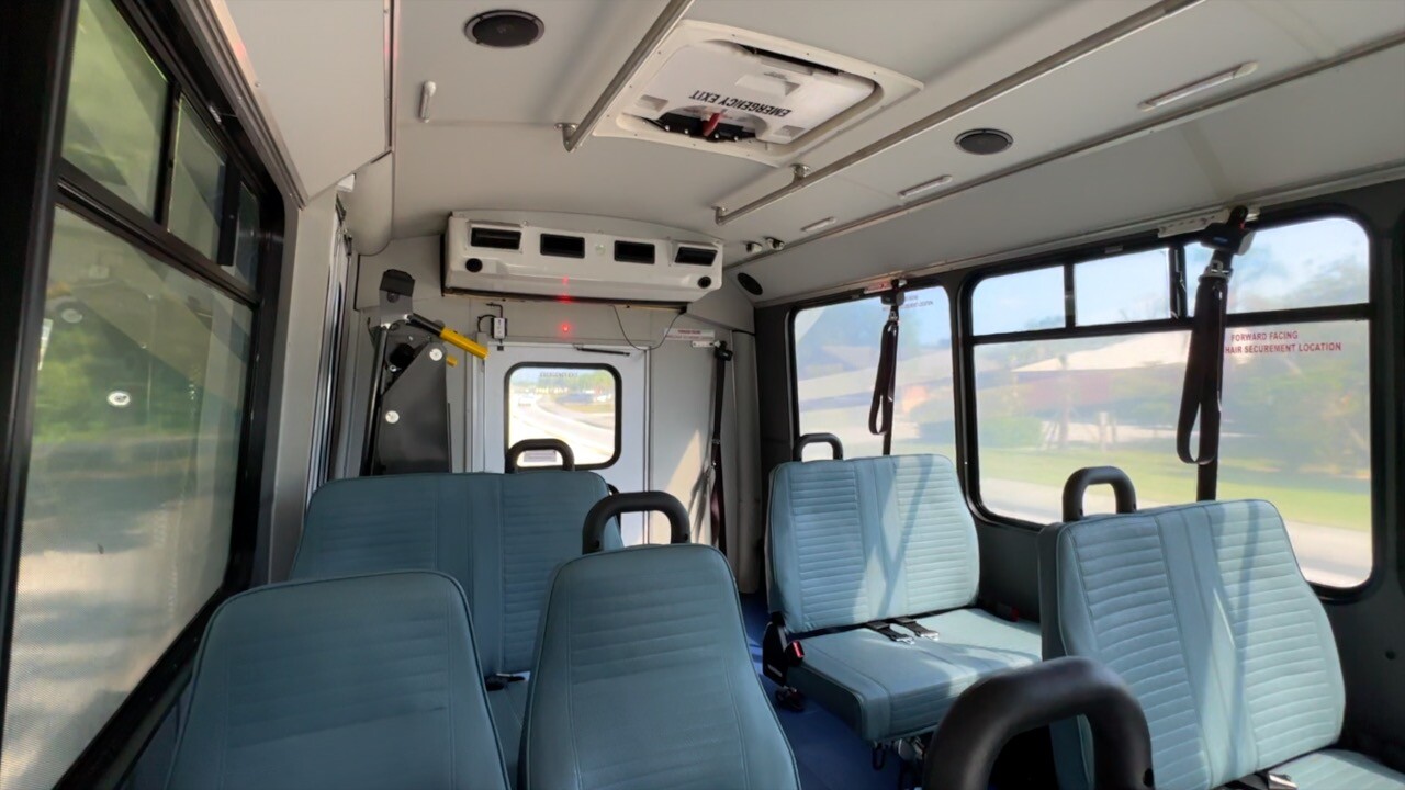 Inside an "ULTRA On-Demand" mini-bus, which seats up to 11 people.