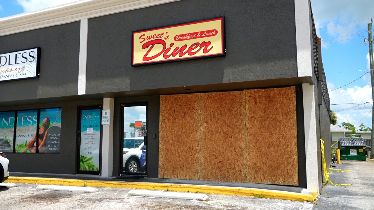 Boarded up frontage of Sweet's Diner in Punta Gorda.