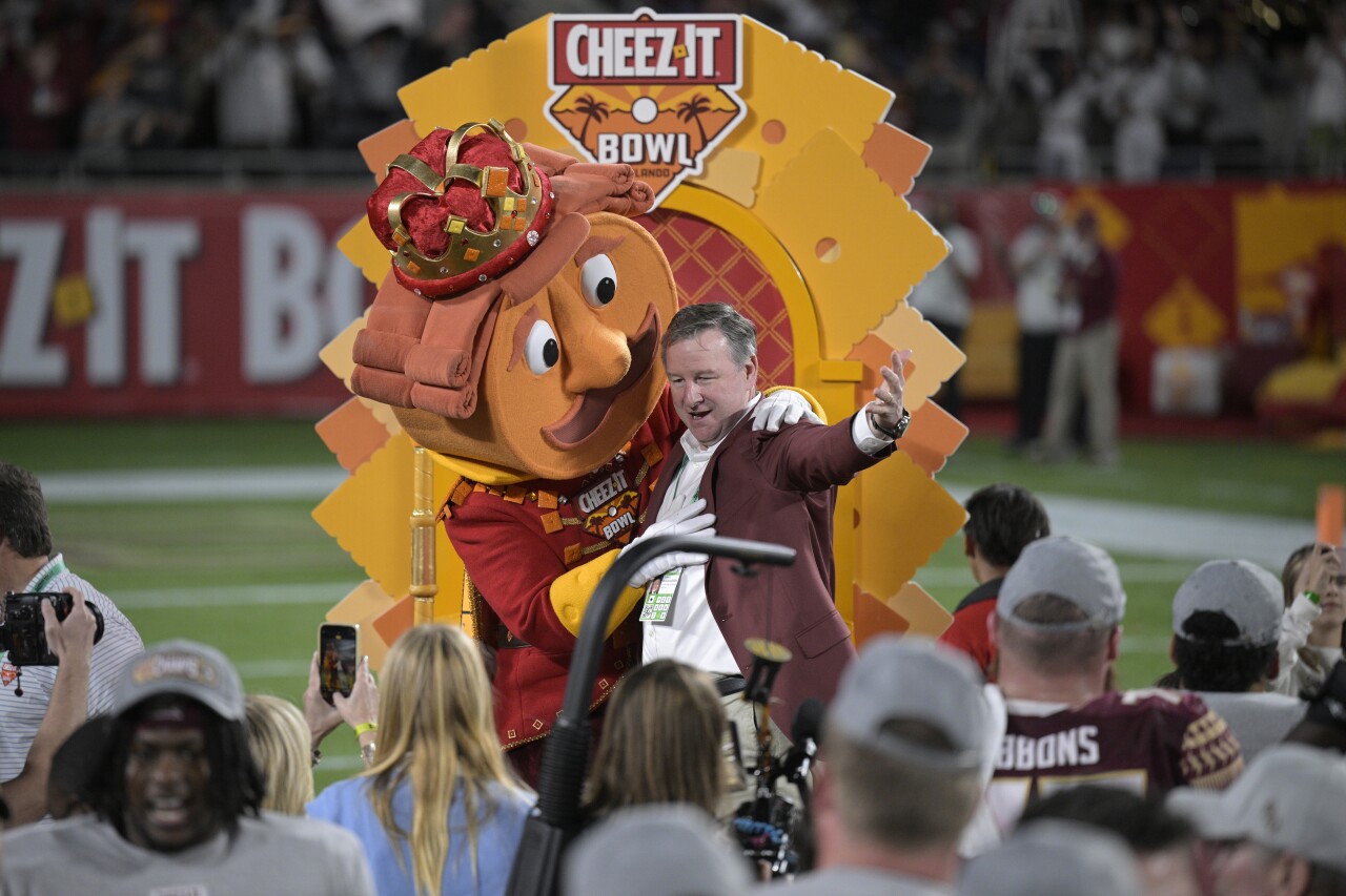 Florida State University President Richard McCullough celebrates after Seminoles victory in 2022 Cheez-It Bowl