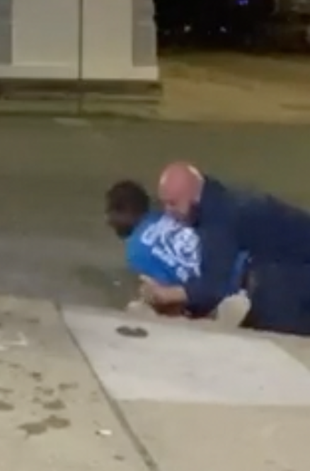 Facebook screenshot of Norwood City Councilman Chris Kelsch on top of Deandre Jones