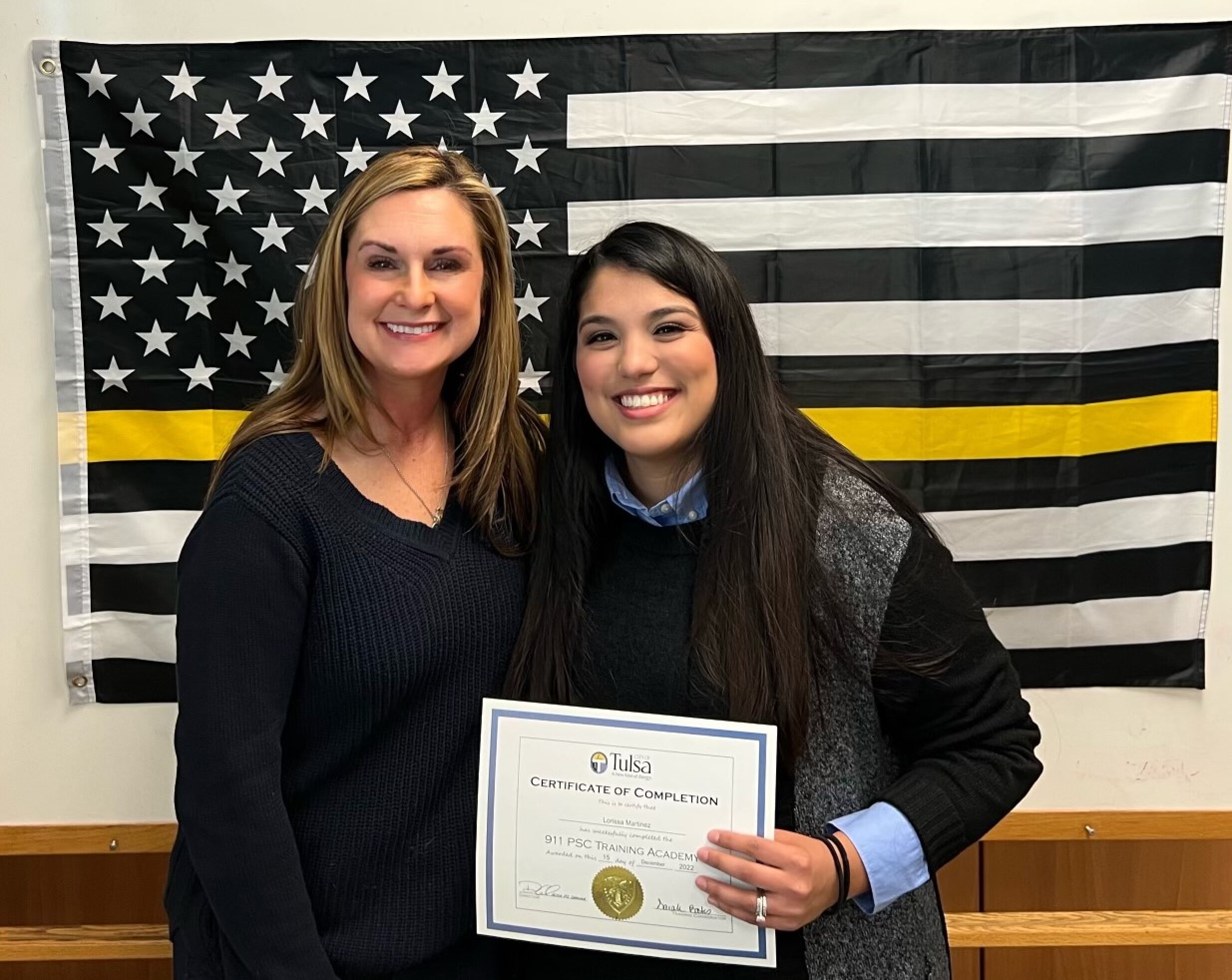 New Tulsa dispatcher reunited with officer who helped her as a child