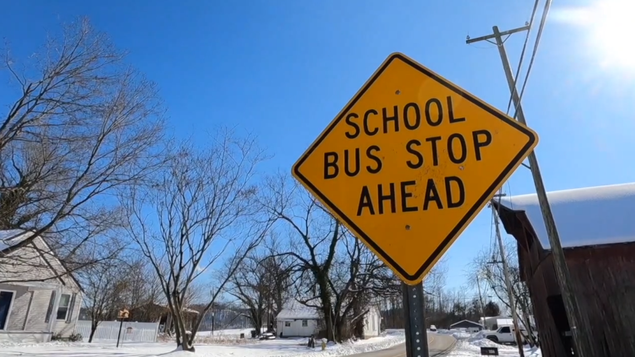 bus stop ahead snow