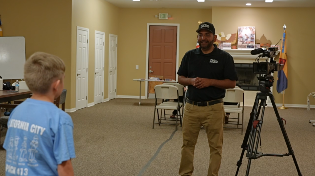 23ABC Neighborhood News Reporter Steve Virgen Interviewing Cub Scout, Jaxon, about what he enjoys about the Scouts