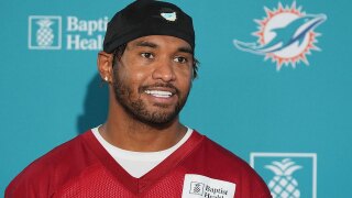 Miami Dolphins quarterback Tua Tagovailoa responds to a question during a news conference at the NFL football team's training camp, Wednesday, July 23, 2025, in Miami Gardens, Fla.