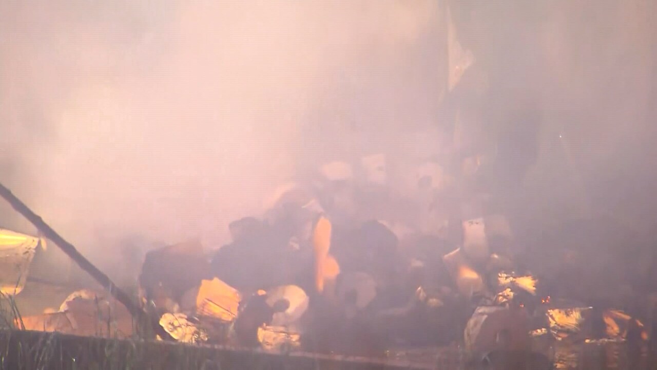 Trailer carrying toilet paper catches fire.