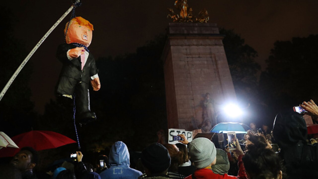 Anti-Trump protesters swarm NYC, Chicago