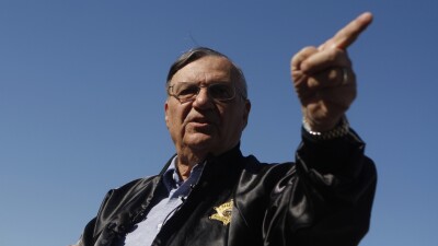 Maricopa County Sheriff Officer Joe Arpaio gestures.