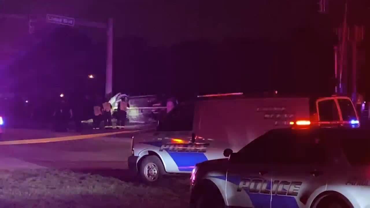 Police shine light at SUV on its side on tracks after fatal Brightline crash in Delray Beach, Feb. 8, 2023