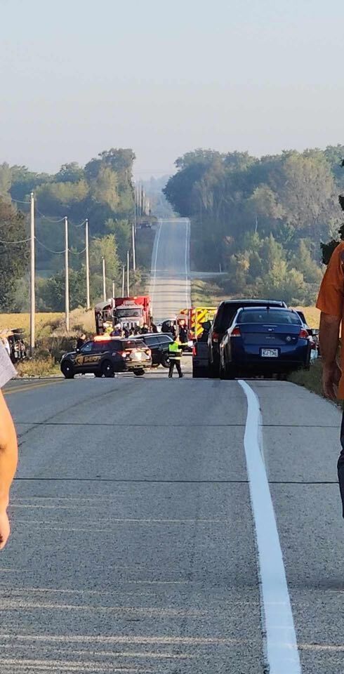 Scene of school bus rollover crash near random lake