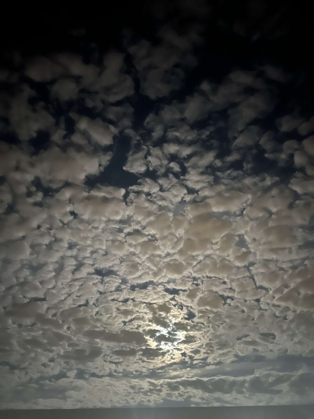 Sturgeon Supermoon shining through the clouds. 
📍 Manitowoc 📸 Brett Teüke