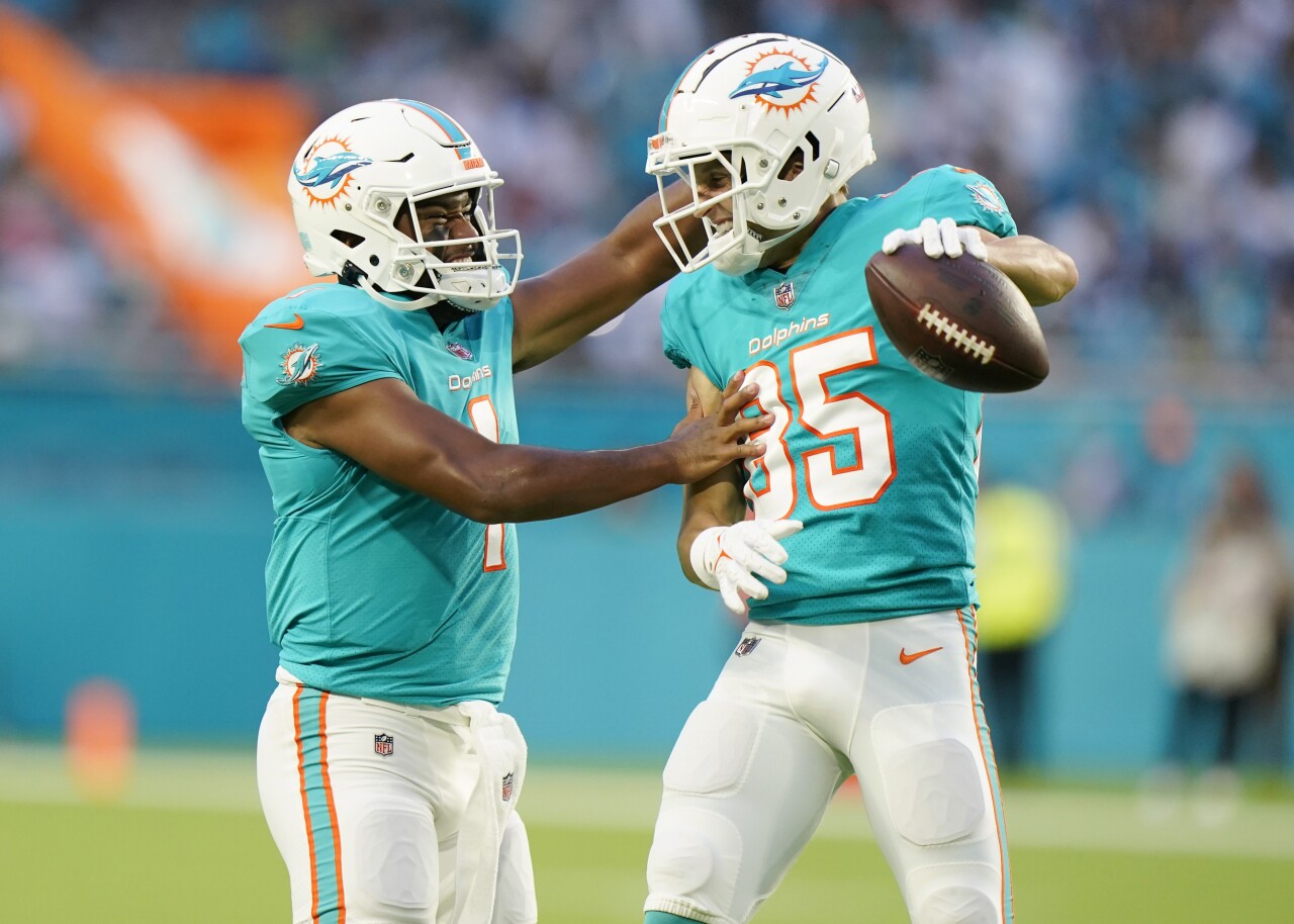 Tua Tagovailoa and and wide receiver River Cracraft celebrate TD in 2021 preseason game vs. Philadelphia Egles