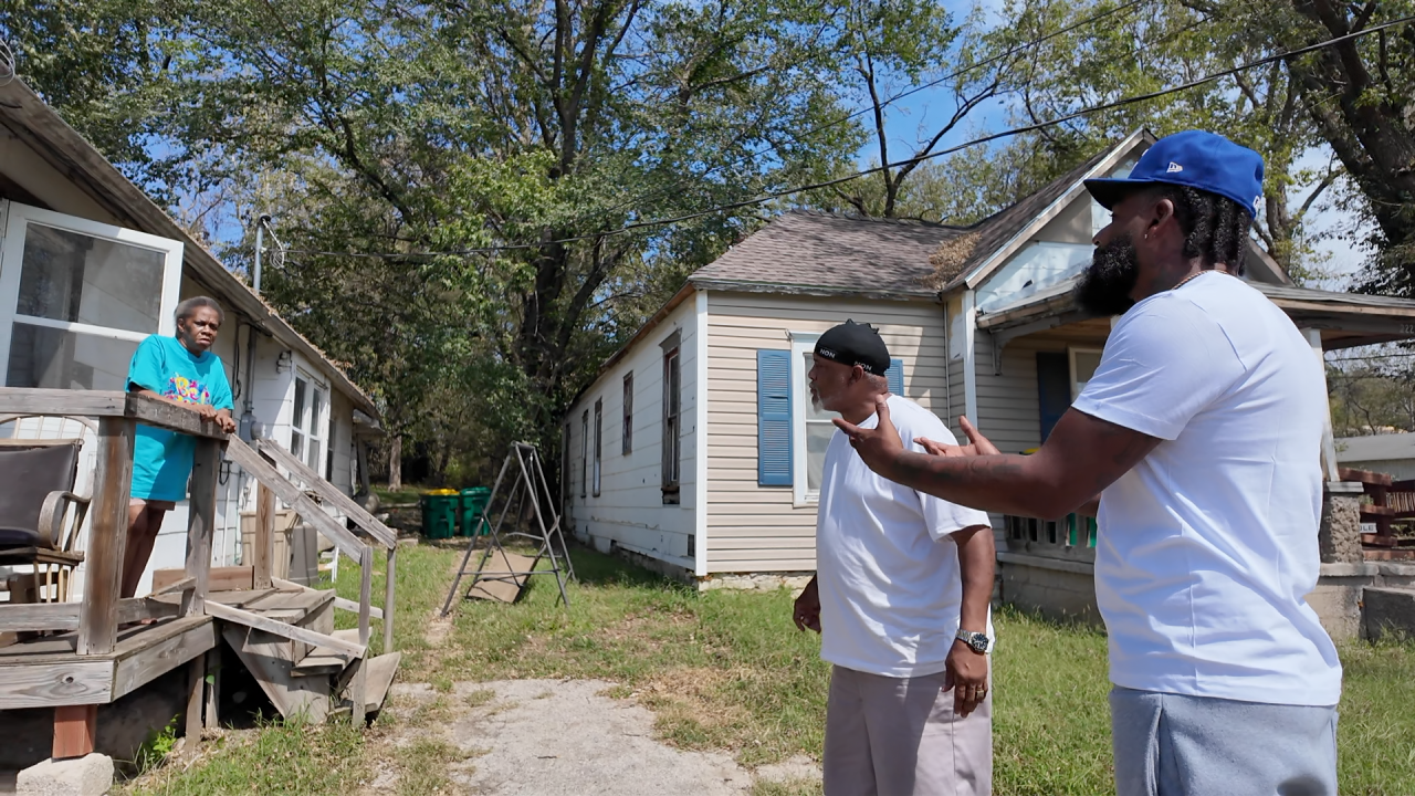 jr speaks with neighbors.png