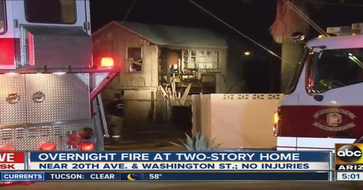 Crews battle fire outside Phoenix house