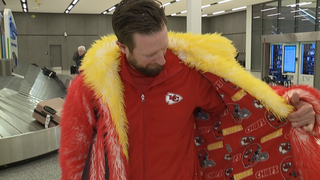 brian switzer shows off his coat.jpg